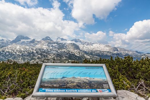 Obertraun, Austria - June 27, 2014: Dachstein Mountains with information sign