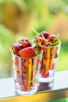 Fresh ripe strawberry in a glass