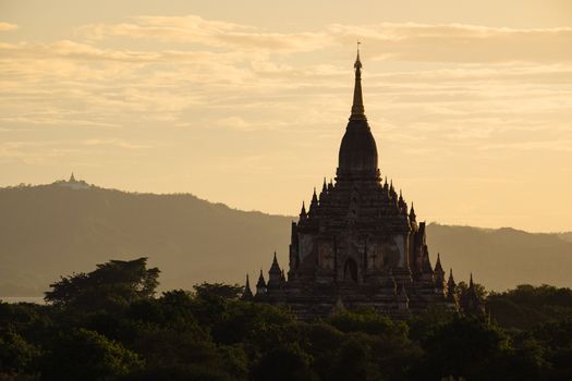 Scenic view of ancient Bagan temple during golden hour, Bagan, Myanmar