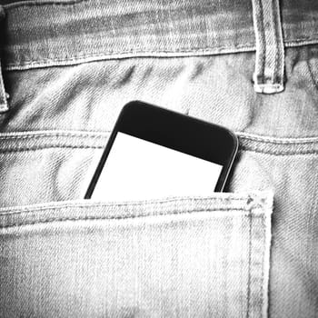 smart phone in jean pocket pants black and white tone color style