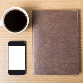 smart phone coffee cup and notebook on wood background