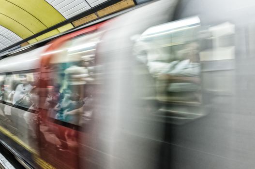 Blurred image of London underground train moving fast.