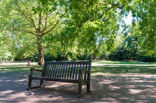 Bench on a beautiful city park.