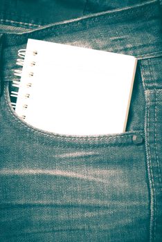 notebook paper in jean pocket pants retro vintage style