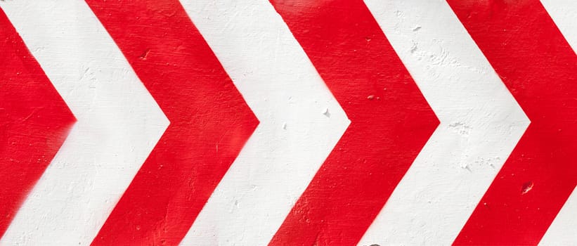 Red and white grunge warning stripes background.