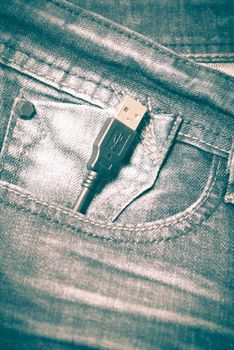 usb cable in jean pocket retro vintage style