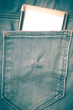 notebook and pencil in jean pocket retro vintage style