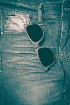 sunglasses on jean pants retro vintage style