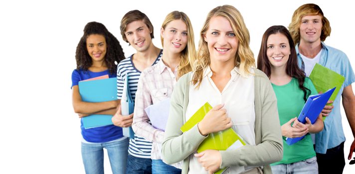 College students holding folders at college against white background with vignette