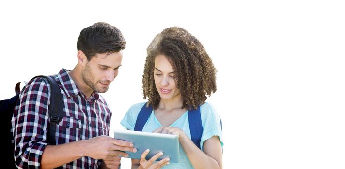 Students using tablet and smiling against white background with vignette