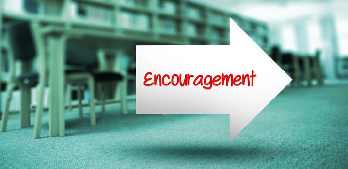 The word encouragement and arrow against volumes of books on bookshelf in library