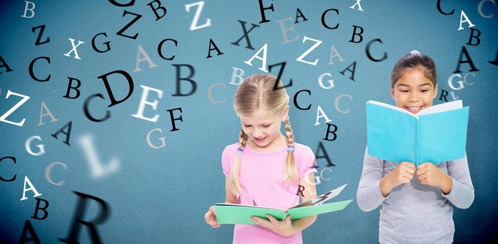 Elementary pupils reading against blue background