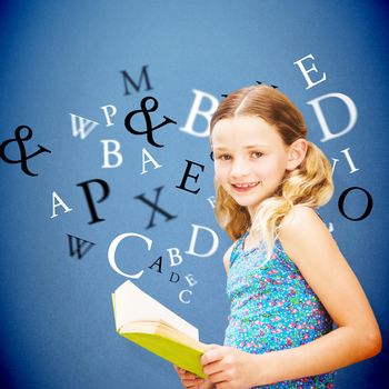 Girl reading book in library against blue background