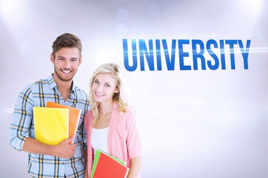 The word university and happy students smiling at camera  against grey background