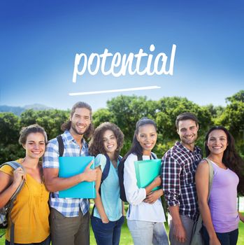 The word potential and smiling group of students standing in a row against park