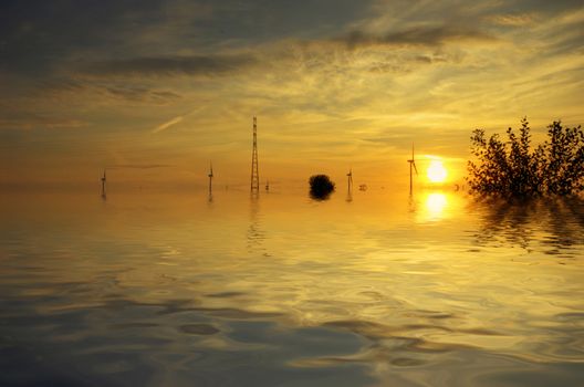 Picture of flood on the field with sundown.