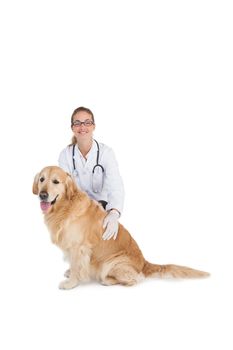 Smiling vet with a labrador on a white background