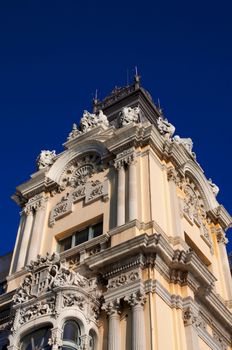 Column of Administrative Port Building on Blue Sky background in Barcelona, Spain