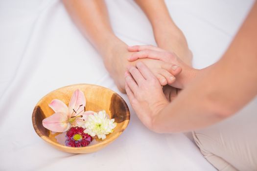 Woman receiving a foot massage at the beauty salon