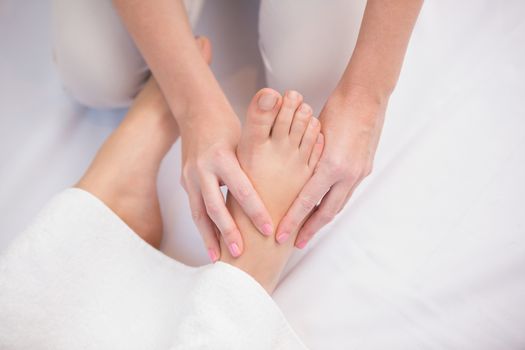 Woman receiving a foot massage at the beauty salon