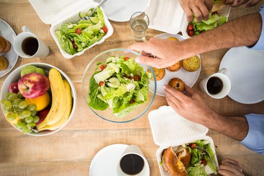 Business people having lunch together in the office