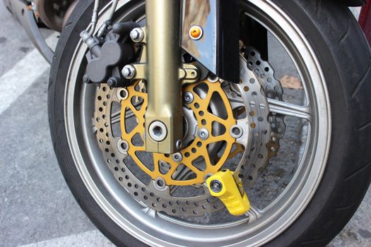 Yellow Disc Lock on Motorbike Disc Brake