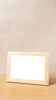 picture frame on wood table background