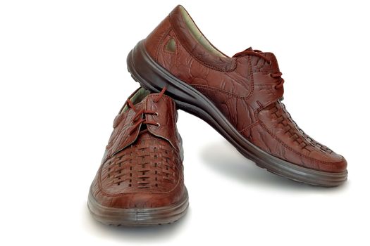 Comfortable leather men's shoes brown. Presented on a white background.