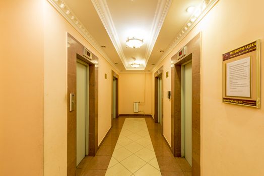 entrance of a residential building with an elevator