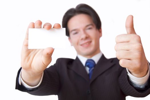 Business card conceptual image. Businessman holding a blank business card.