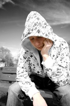 Emotion conceptual image. Depressed teenager.