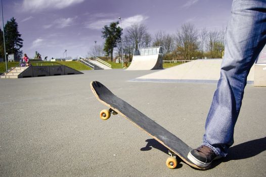 Skateboarder conceptual image. Picture of skateborad in skatepark.