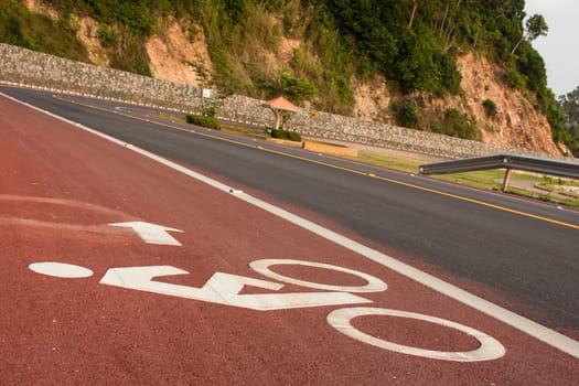 Bicycle road sign and arrow in outdoors