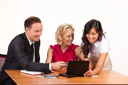 Three young people watching the video on a portable DVD player