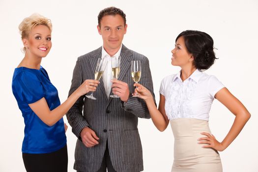 Young people drinking the wine from glasses on isolated background