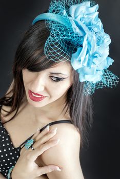 beautiful glamour woman smiling with blu circlet in her hair