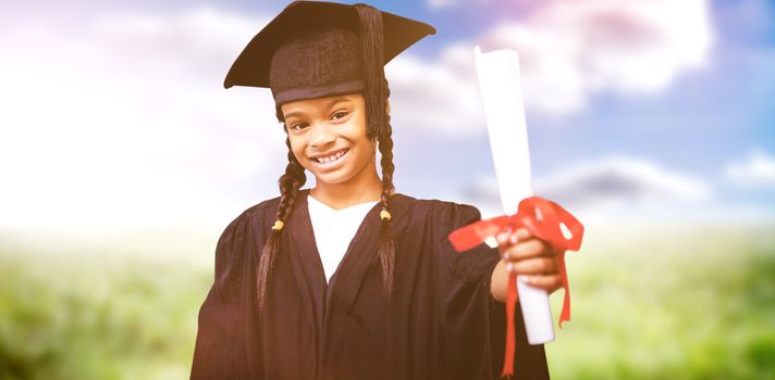Cute pupil in graduation robe against sunny landscape