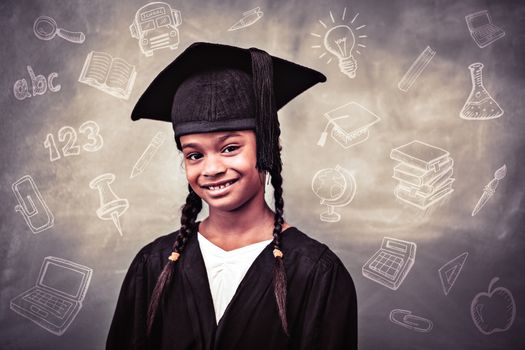 Education doodles against little girl wearing graduation robe