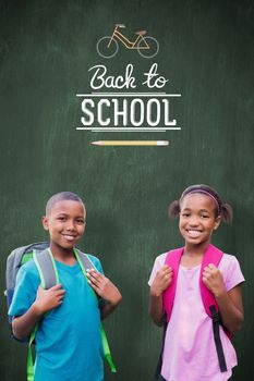 happy pupils against green chalkboard