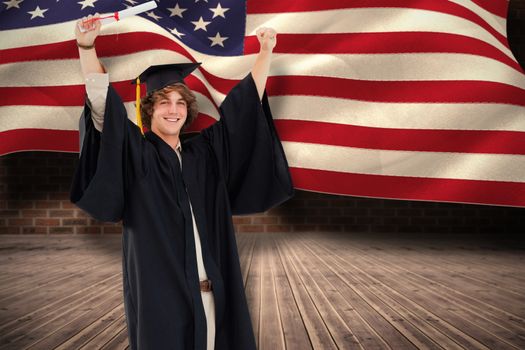 Male student in graduate robe raising his arms against composite image of digitally generated united states national flag