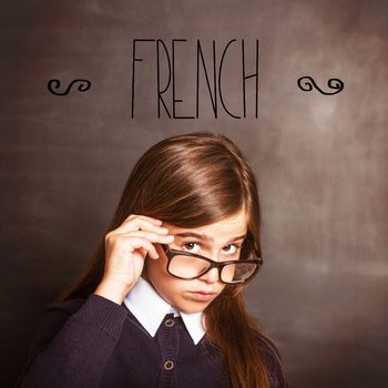 The word french against cute pupil smiling at camera