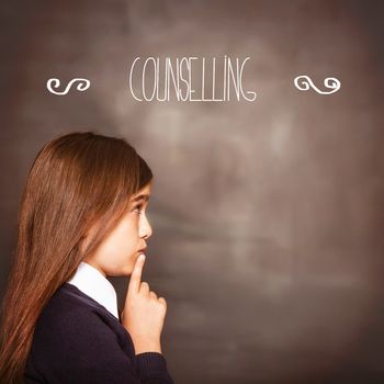 The word counselling against cute pupil looking a chalkboard