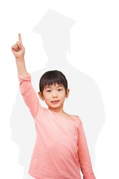 Happy pupil with hand raised against silhouette of graduate