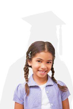 Happy pupil against silhouette of graduate