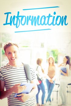 The word information against handsome student smiling and holding tablet