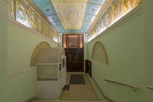 entrance of a residential building with an elevator