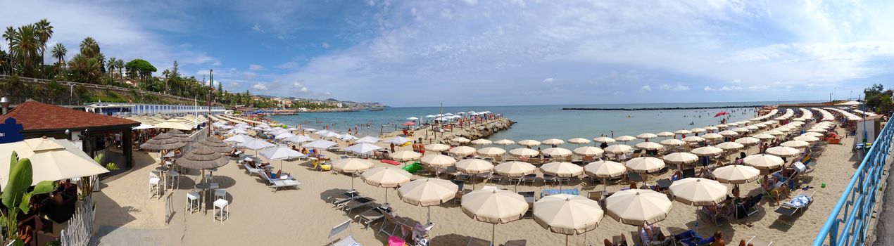 Panoramic view of beach umbrellas in San Remo Beach, Liguria, Italia