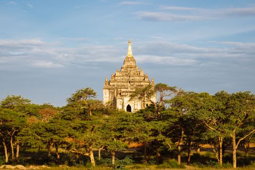Scenic view of beautiful ancient temple behind trees, Bagan, Myanmar