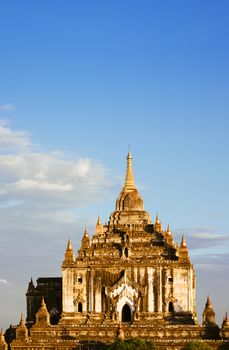 Landscape vertical view of ancient temple Thatbyinyu in Bagan at sunset, Myanmar