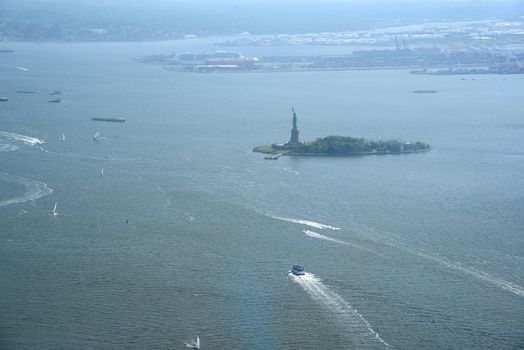 aerial view of statue of liberty island in new york from one world trade center observatory